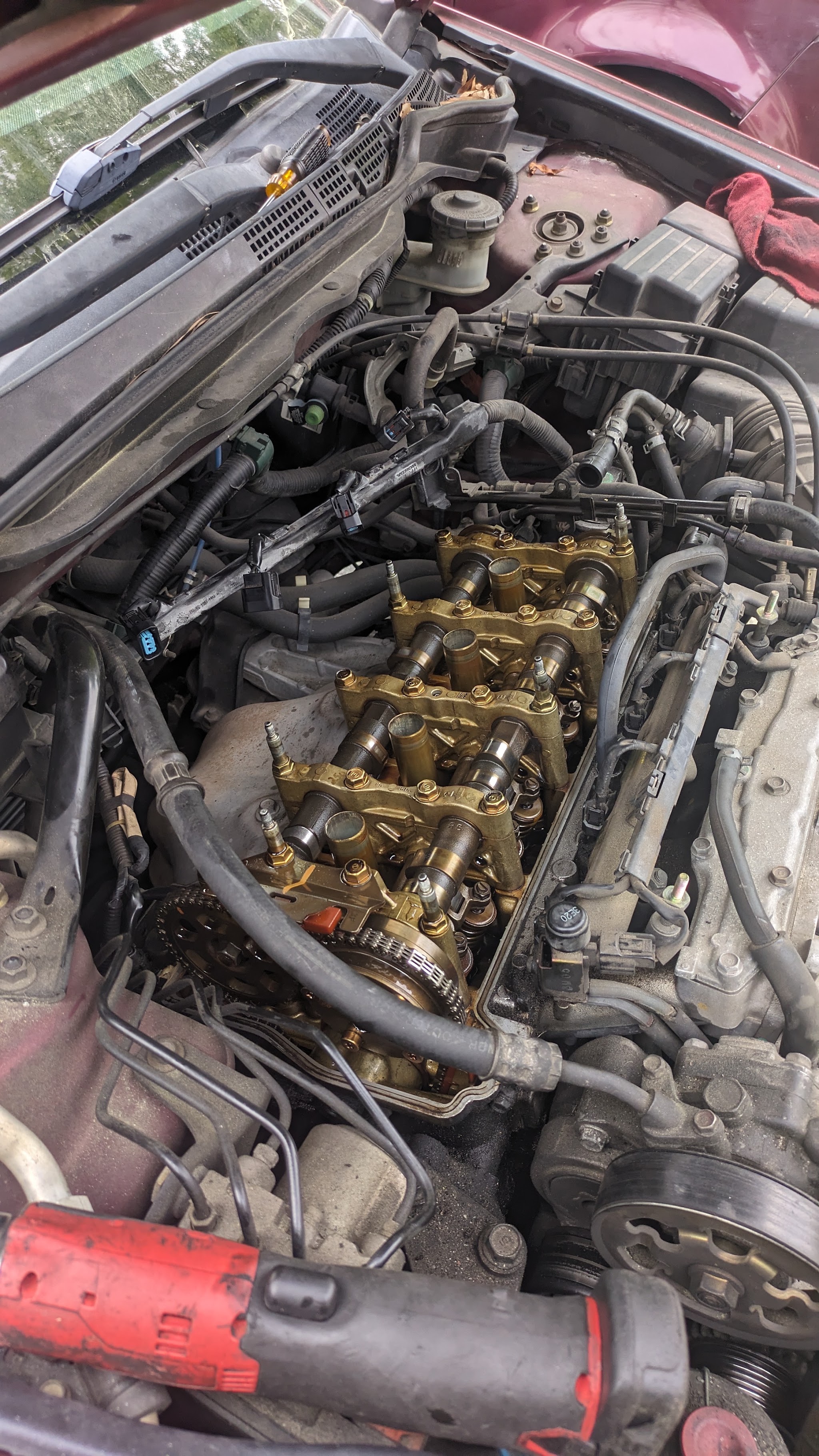Engine with the valve cover off and camshafts exposed
